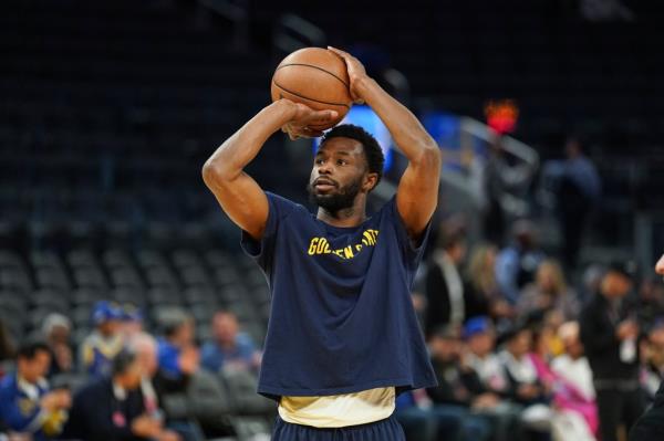 Andrew Wiggins #22 of the Golden State Warriors warms up before the game against the New Orleans Pelicans at Chase Center on April 12, 2024 in San Francisco, California.