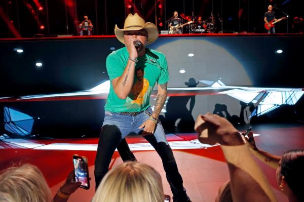 Jason Aldean performs o<em></em>nstage during day three of CMA Fest 2023 at Nissan Stadium on June 10 in Nashville.