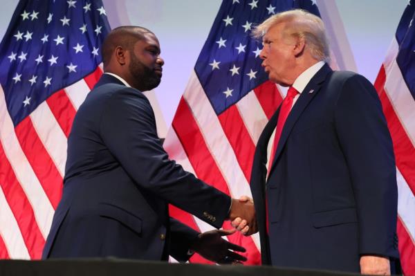 Do<em></em>nalds (R-FL) shakes hands with  former U.S. President Do<em></em>nald Trump during the Moms for Liberty Joyful Warriors natio<em></em>nal summit at the Philadelphia Marriott Downtown on June 30, 2023 in Philadelphia, Pennsylvania.