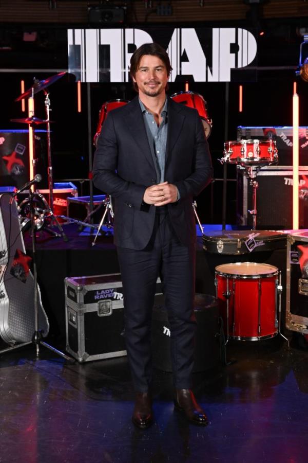 Josh Hartnett standing in front of a drum set at the 'Trap' photocall at The O2 Arena in London, England