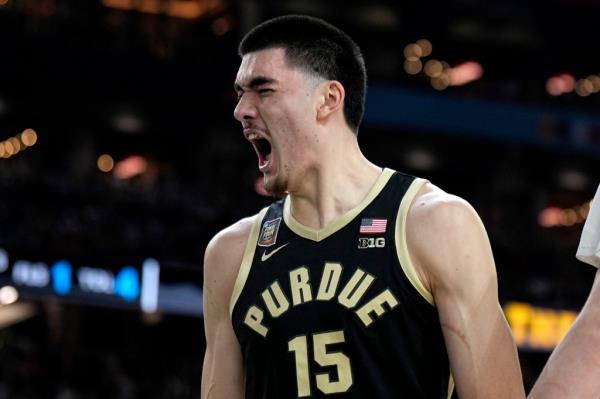 Purdue center Zach Edey celebrating after blocking a shot against UConn during the NCAA college Final Four champio<em></em>nship basketball game, April 8, 2024, in Glendale, Ariz.