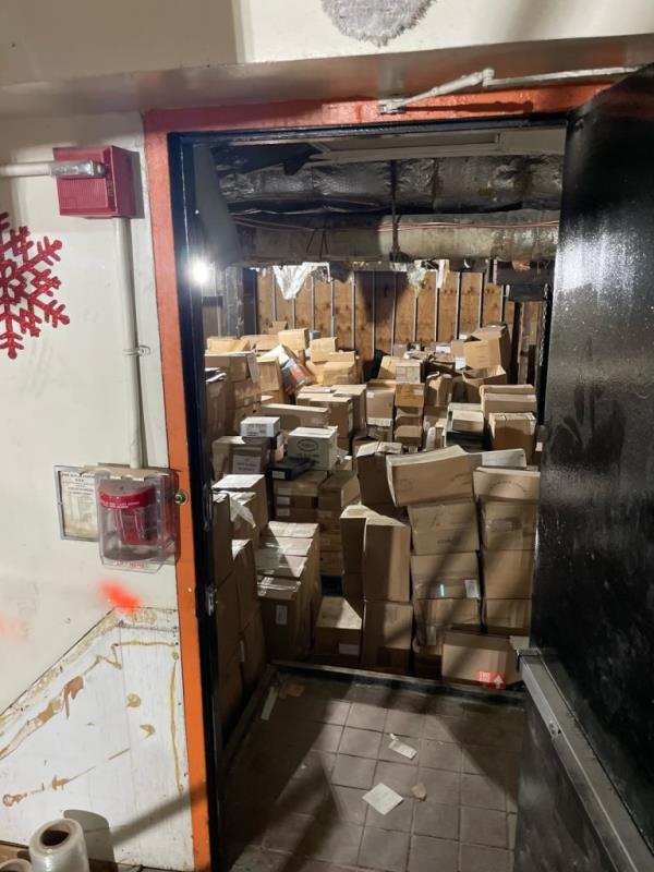 Wine boxes stacked on top of each other.