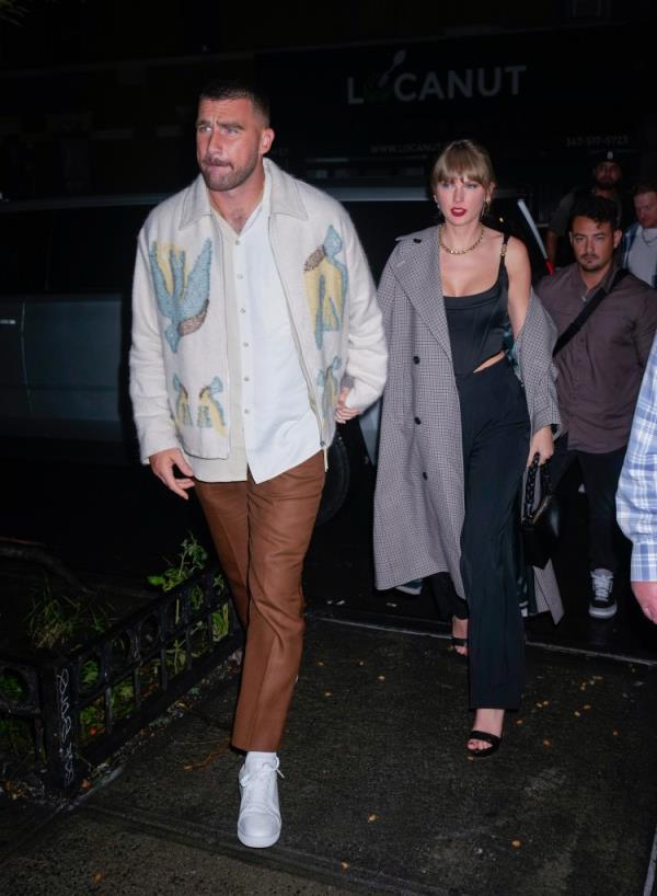 Travis Kelce and Taylor Swift arrive at SNL Afterparty on October 15, 2023 in New York City.  