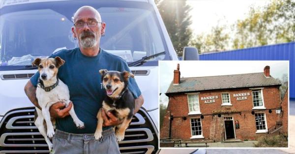 Rob Brown is sleeping in his campervan outside the ruins of the Crooked House pub (Picture: SWNS)