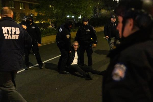 NYPD and protesters face off at Columbia University on April 24