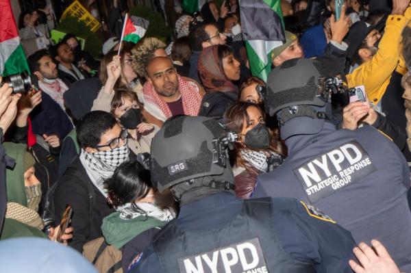 Police enter an area wher<em></em>e fenced off Pro-Palestinian protesters gather and arrrested at least one person near 1165h St  Amsterdam Ave near Columbia University on Saturday evening.