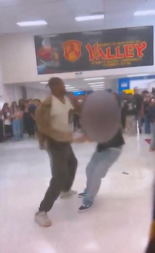 Video captured both parties swinging at each other before Smith co<em></em>nnected several times on the pupil, eventually knocking him down.