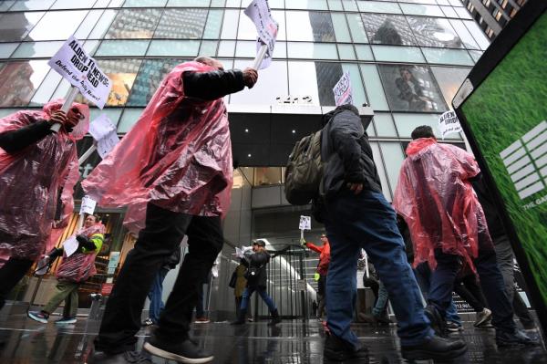 Daily News workers pictured outside of the company's rented co-working space in Midtown Manhattan, which can reportedly o<em></em>nly fit six staffers.