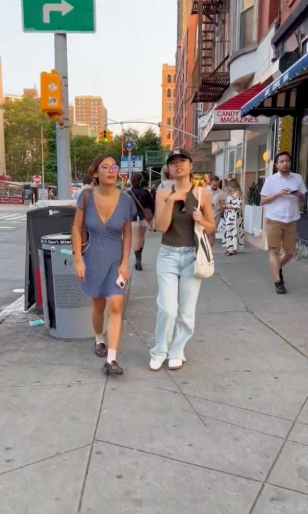 People walk through Lower Manhattan