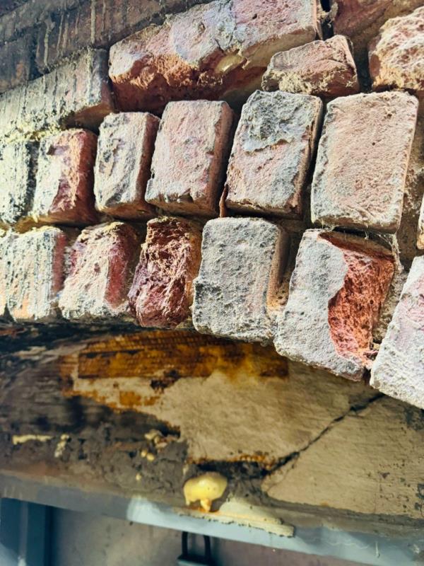 A photo of deteriorating bricks on the 219 E. 5th St. building.