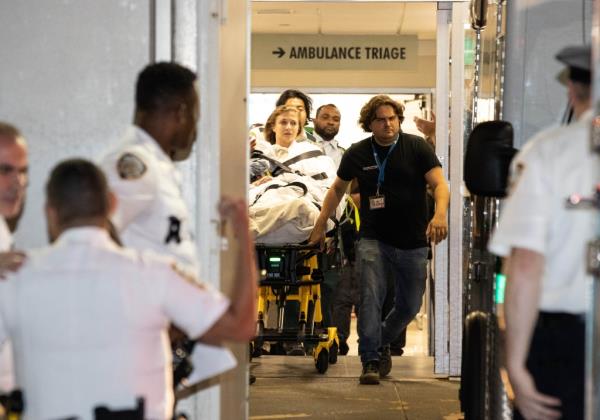 The victim is rushed for medical treatment.