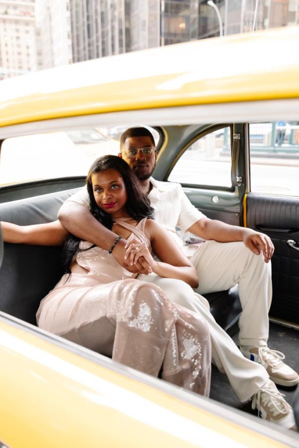 Re'Shae Green and Corey Fields, 29, during their retro taxi engagement. 