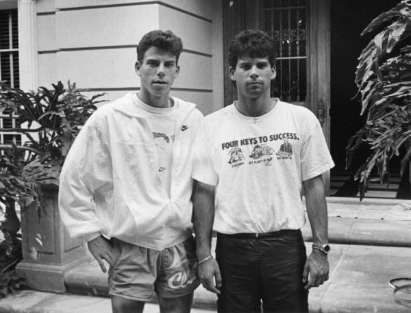 Erik and Lyle Menendez in front of their home