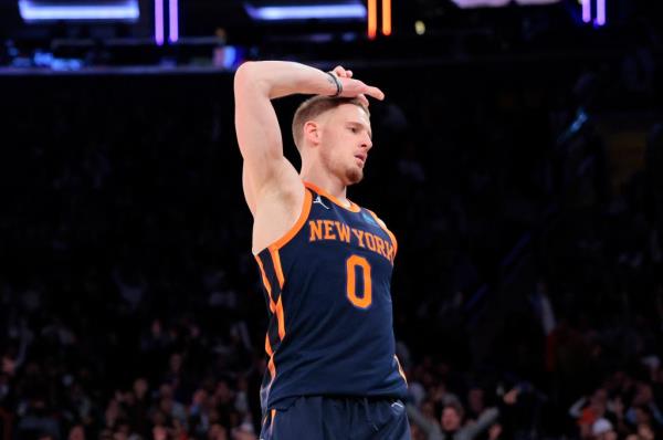 New York Knicks guard Do<em></em>nte DiVincenzo #0 reacts after hitting a three point shot during the fourth quarter in a game against the Utah Jazz.