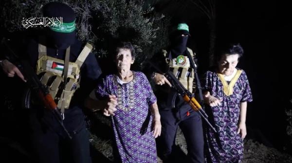 Yocheved Lifshitz, left, and Nurit Cooper getting released by Hamas on Oct. 23, 2023.