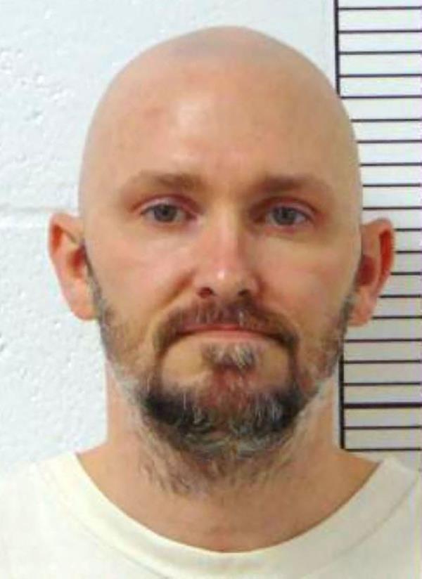 Michael Tisius, 42, was executed on Tuesday evening for the murder of two Missouri jailers in 2000. 
