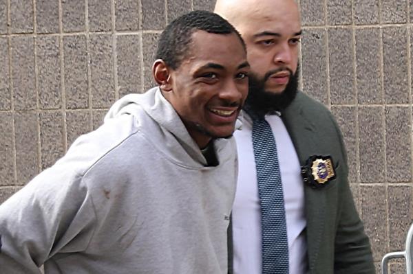 Carlton McPherson is led away by cops earlier in the week; he is suspected of pushing a man to his death on the No. 4 train.