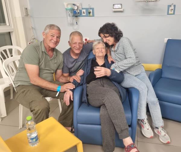The family of Israeli hostage Yaffa Adar reunite with her in the hospital after she was freed from Hamas captivity.