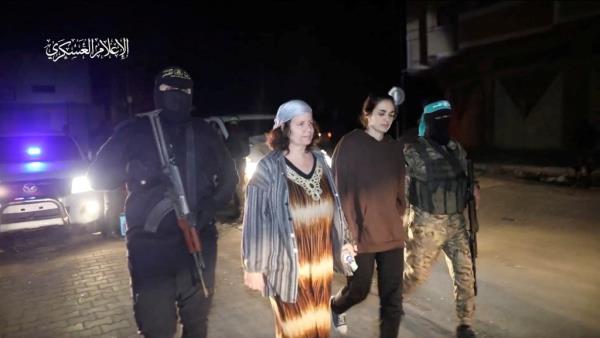 Hostages abducted by Hamas terrorists during the Oct. 7 attack on Israel are handed over to the Internatio<em></em>nal Red Cross on Nov. 29, 2023, in the Gaza Strip.