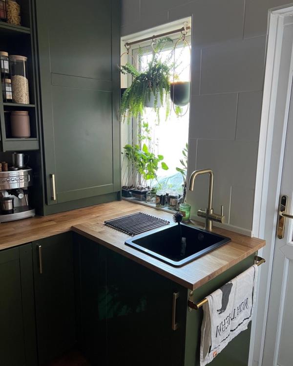 Photo of a sink in a kitchen. 