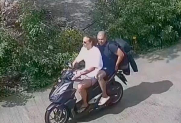 The suspect and victim were seen on surveillance video riding on a motorbike together. 