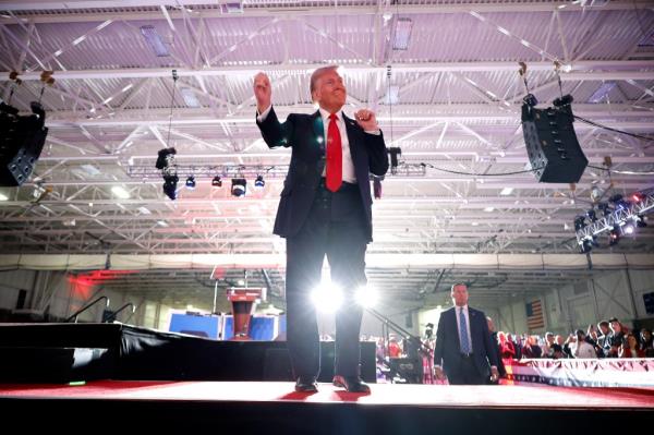 Trump dances his way off stage at the end of a rally in Warren, Michigan on Nov. 1. 