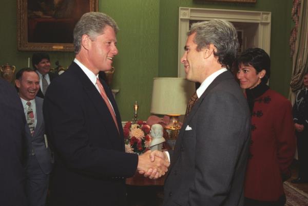 Then-President Bill Clinton meets Jeffrey Epstein and Ghislaine Maxwell at the White House in 1993 at an event for the White House Historical Association.