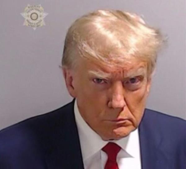 handout image released by the Fulton County Sheriff's Office on August 24, 2023 shows the booking photo of former US President Do<em></em>nald Trump. Former US president Do<em></em>nald Trump was photographed for a police mug shot after his arrest on August 24 at the Fulton County Jail in Georgia, multiple US media outlets reported citing local officials. The picture, which has yet to be released, is set to become a world-famous image as Trump fights multiple criminal cases at the same time as running to regain the White House in next year's election.