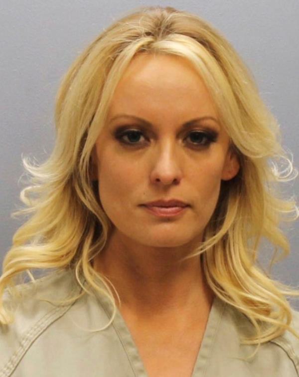 This photo provided by the Franklin County Sheriff's Office on Thursday, July 12, 2018, shows porn actress Stormy Daniels. Daniels was arrested at a Columbus, Ohio strip club and is accused of letting patrons touch her in violation of a state law, her attorney said early Thursday. (Franklin County Sheriff's Office via AP)