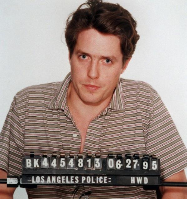 British actor Hugh Grant is shown in a Los Angeles Police Department booking photograph on June 27, 1995, following his arrest for lewd co<em></em>nduct with a prostitute on Sunset boulevard in Hollywood. If Do<em></em>nald Trump has his mug shot taken when he is arrested again this week, it will instantly become one of the most famous pictures on the planet, and one of a handful of forever-talked-a<em></em>bout police photographs. Trump has been ordered to surrender to authorities in the US state of Georgia, wher<em></em>e he faces charges for racketeering related to his efforts to overturn the 2020 election.