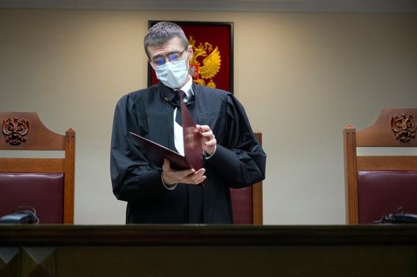 Russian Supreme Court judge Oleg Nefedov leads a hearing in the Russian Supreme Court in Moscow, Russia, Thursday, Nov. 30, 2023.