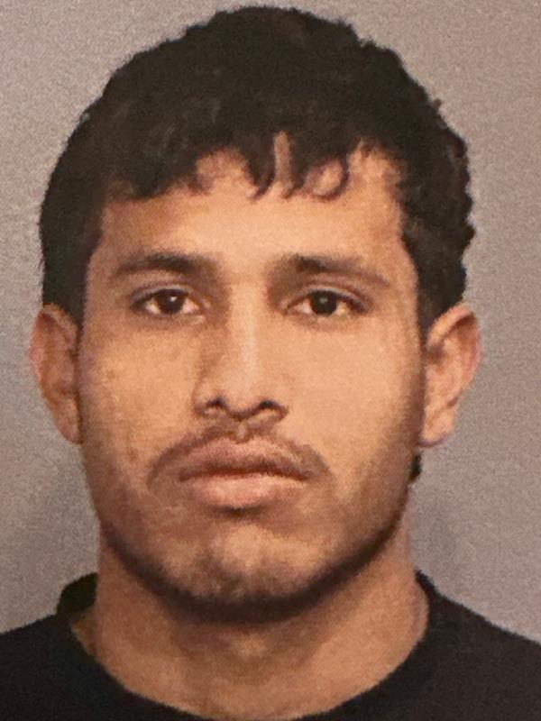 Photo showing Jhoan Boada after he was arrested in the beating of two police officers.