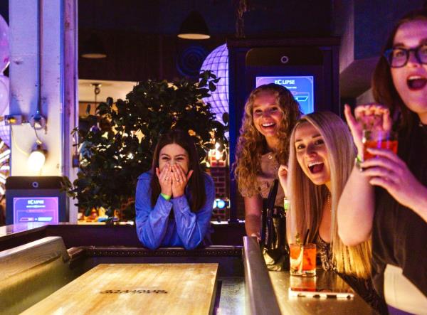 Interior of female guests at Electric Shuffleboard.