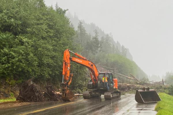 A worker clears debris after a deadly landslide in Ketchikan, Alaska on Sunday. 