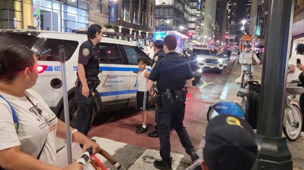 An 11-year-old migrant boy was arrested after a violent subway robbery, according to the NYPD.</p>

<p>　　
