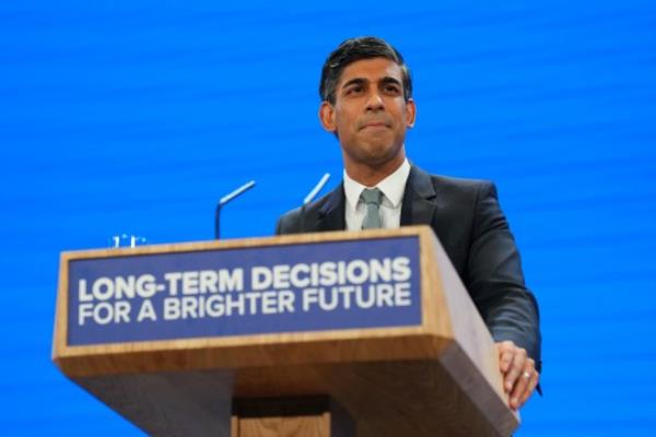 MANCHESTER, ENGLAND - OCTOBER 4: Prime Minister Rishi Sunak speaks during the final day of the Co<em></em>nservative Party Co<em></em>nference on October 4, 2023 in Manchester, England. Rishi Sunak delivers his first speech as Co<em></em>nservative Party Leader to members and delegates today. He is expected to announce the scrapping of the Manchester leg of the HS2 rail l<em></em>ink and suggests alternatives. (Photo by Carl Court/Getty Images)