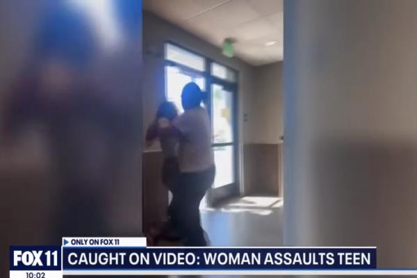 People can be seen recording the attack but not helping at a McDonald's in Los Angeles' Harbor City neighborhood. 