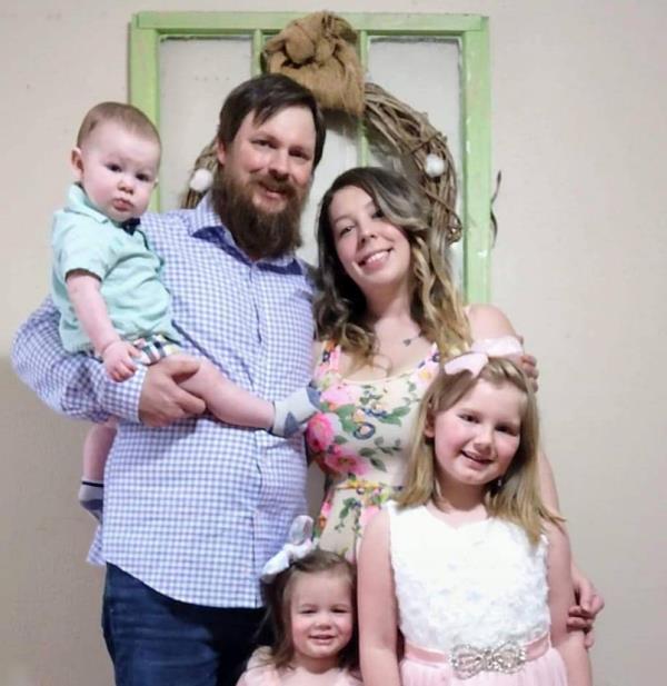 Robert Hall, his fiancee Melina Rich and three of his children