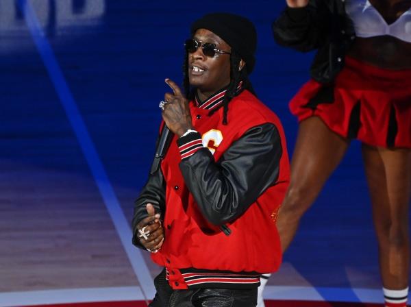 Rapper Young Thug performs at halftime during the Boston Celtics v Atlanta Hawks game at State Farm Arena on November 17, 2021 in Atlanta, Georgia.