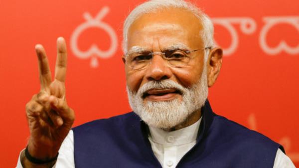FILE PHOTO: Indian Prime Minister Narendra Modi gestures, at the Bharatiya Janata Party (BJP) headquarters in New Delhi, India, June 4, 2024. REUTERS/Adnan Abidi/File Photo