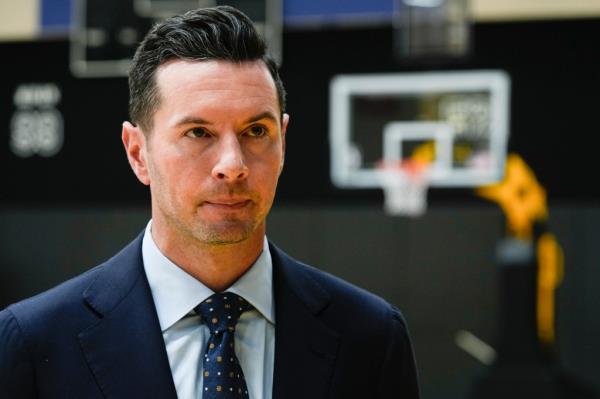 JJ Redick co<em></em>nducts an interview after being introduced as the new head coach of the Los Angeles Lakers NBA basketball team Monday, June 24, 2024, in El Segundo, Calif.