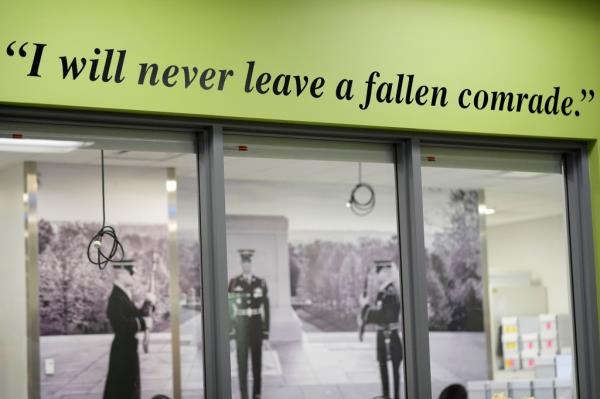 A quote is seen on a wall outside of a Defense POW/MIA Accounting Agency lab at Offutt Air Force ba<em></em>se, Monday, May 20, 2024, in Bellevue, Neb. 