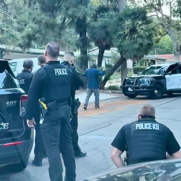 Police arresting Aldrich