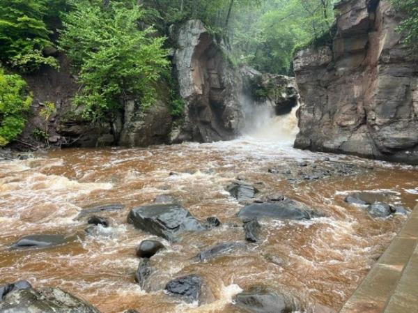 Teenager dies after leaping off popular waterfall