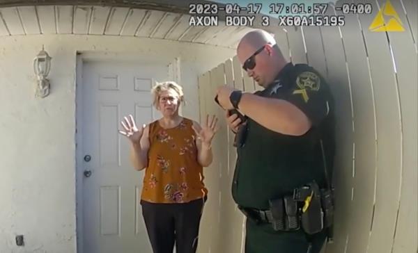 Susan Lorincz talking to a deputy.