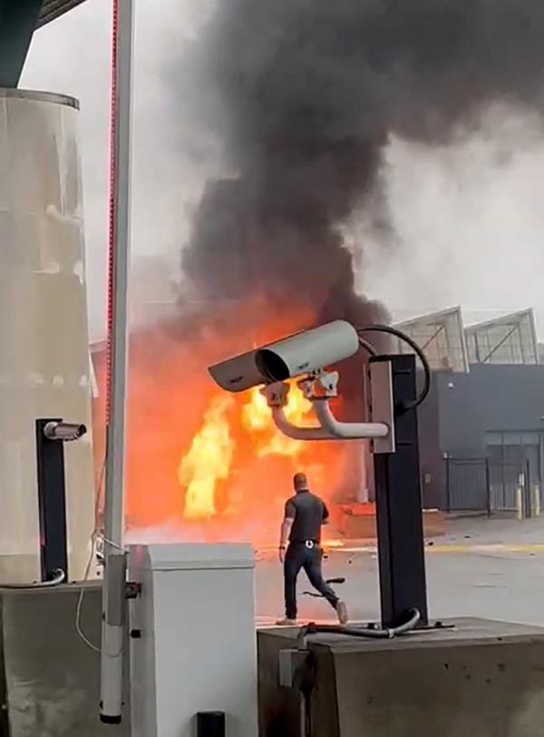 A fire erupts at the border wher<em></em>e the car was located.