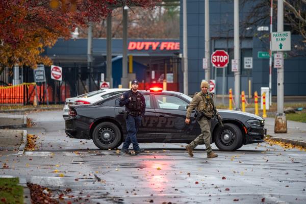 Law enforcement perso<em></em>nnel are pictured blocking off the entrance to the Rainbow Bridge.