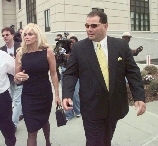 Victoria Gotti , left, and her husband Carmine Agnello leave the Federal Courthouse in White Plains after a bail hearing for her brother, John Gotti, Jr. on Sept. 22, 1998. 