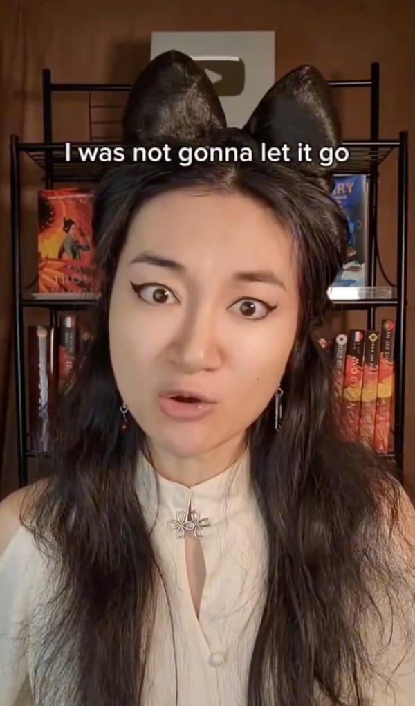 Xiran Jay Zhao is pictured in a video explaining how she determined the reviews were left by Corrain.