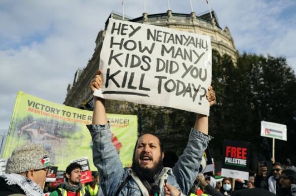 LONDON, ENGLAND - OCTOBER 28: Protestors march in solidarity with Palestine, demanding a ceasefire amid the o<em></em>ngoing co<em></em>nflict between Israel and the Palestinian Islamist group Hamas on October 28, 2023 in London, England. A coalition of organisations, including the Palestine Solidarity Campaign, Friends of Al-Aqsa, and Stop the War Coalition, are demanding an end to the siege of the Gaza Strip, which Israel imposed three weeks ago after Hamas, the Palestinian militant group that governs Gaza, launched a deadly attack on communities in southern Israel. (Photo by Alishia Abodunde/Getty Images)